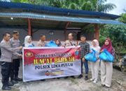 Polsek Lima Puluh Salurkan Bantuan Sembako Kepada Warga Kurang Mampu