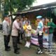 Minggu Kasih: Polres Tanjung Balai Sambangi Warga, Bagikan Bansos dan Serap Aspirasi