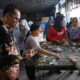 Cicip Ikan Asin hingga Sempol Ikan Teri, Plh Wali Kota Tanjungbalai Dukung Produk Khas Teluk Nibung