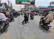 Sat Lantas Polres Tanjung Balai Amankan Arus Pulang Sekolah, Siswa Diseberangkan