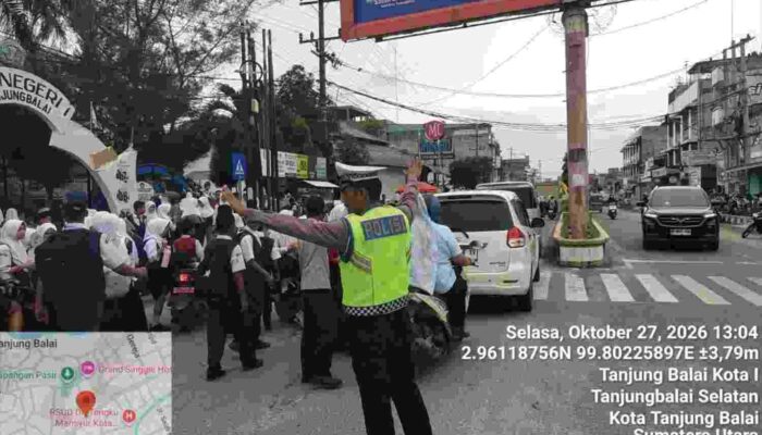 Ops Patuh Toba 2026, Sat Lantas Polres Tanjungbalai Amankan Arus Pulang Sekolah di Bundaran SMPN 1